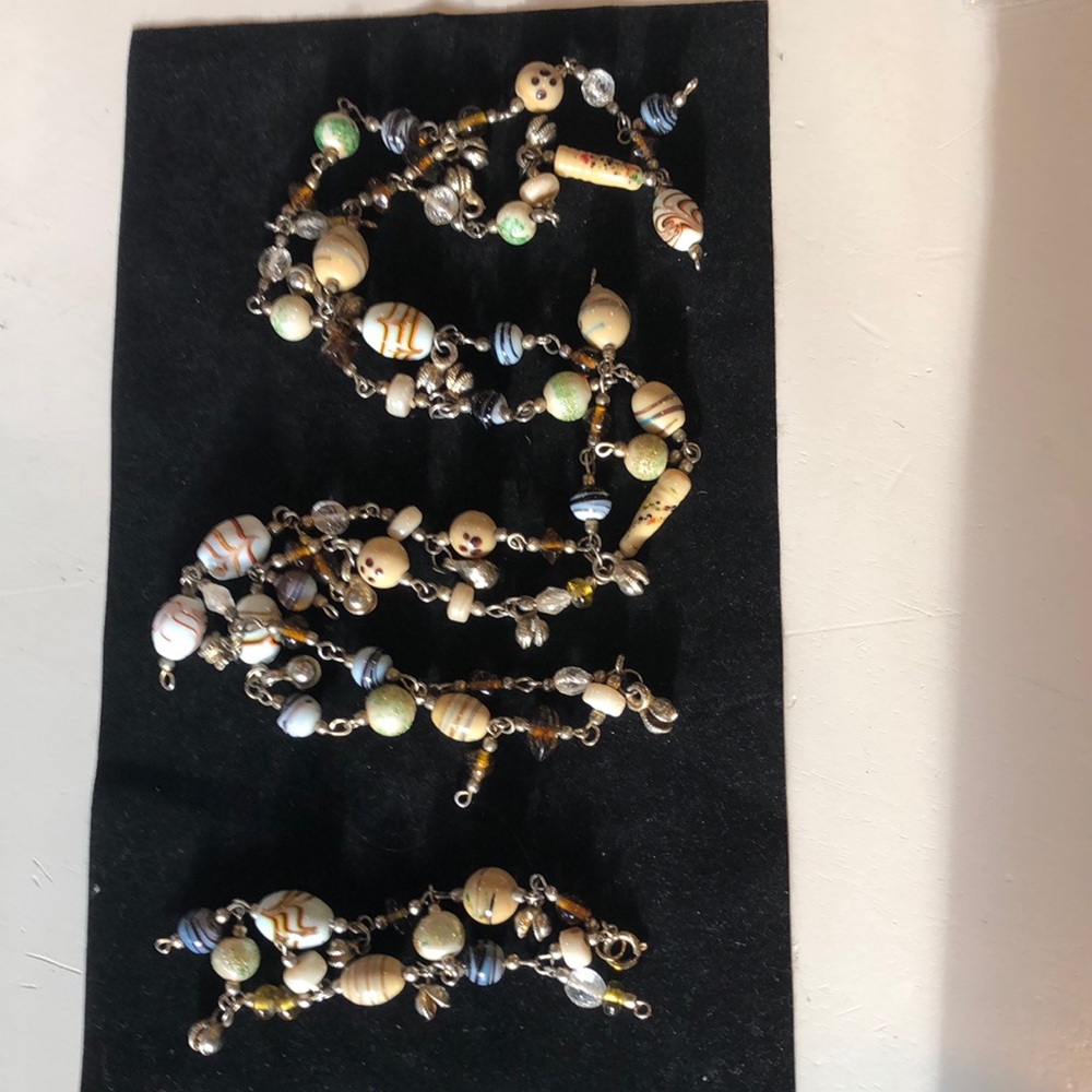 Whimsical beaded necklace 40” and bracelet 8”.